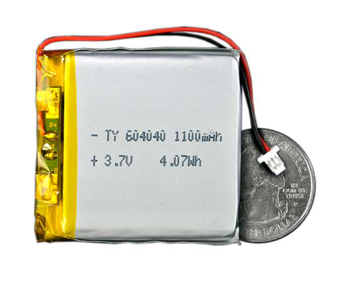 Lithium Ion Polymer Battery - 3.7V 1100mAh quarter size comparison